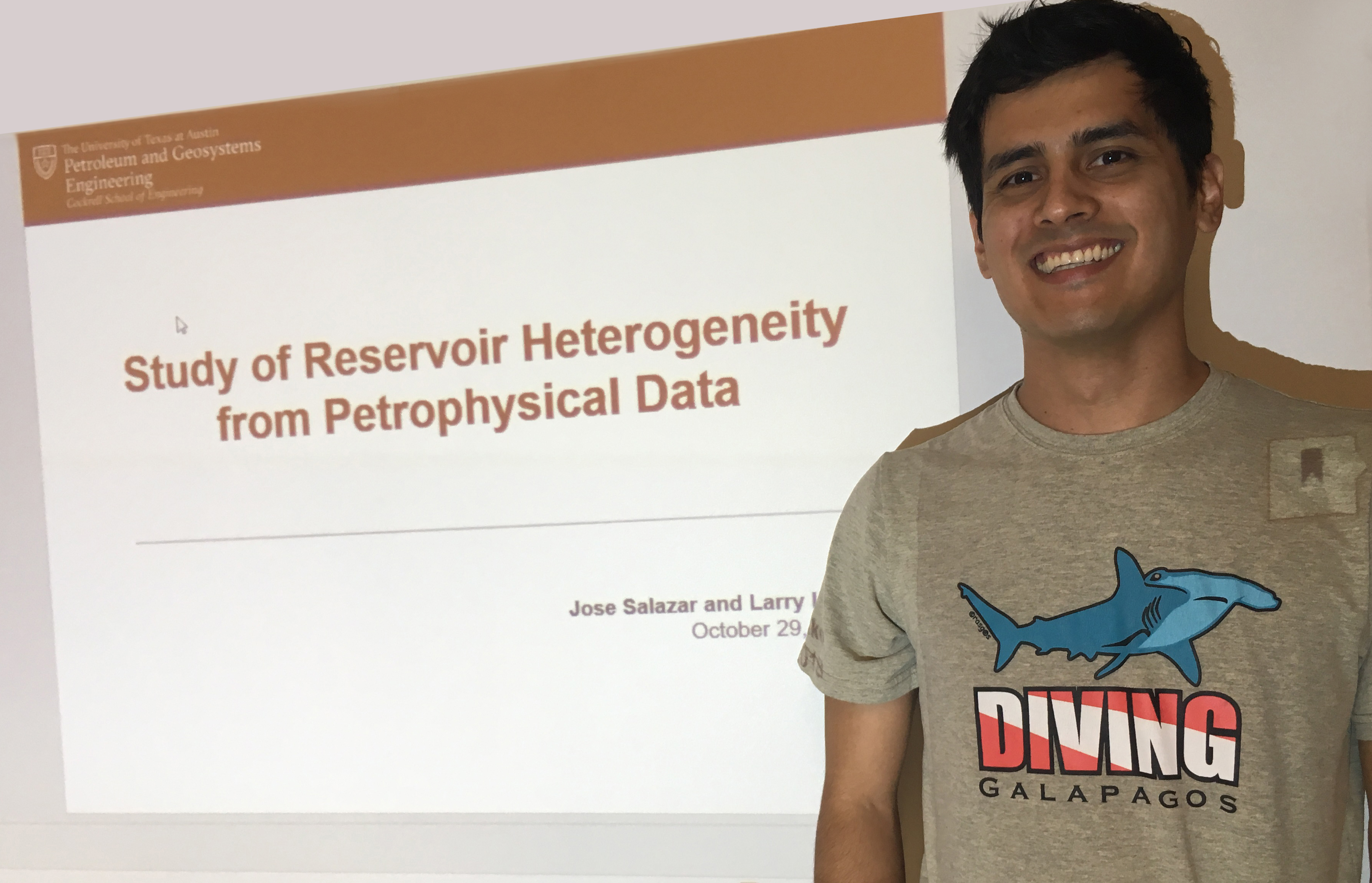 Jose Salazar stands in front of his presentation intro slide