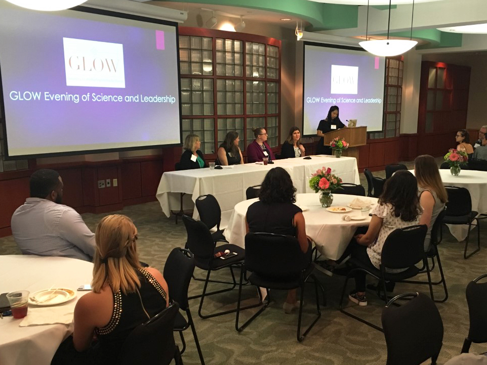 The meeting room was filled with guests as a panel of four speakers talk about the future of industry 