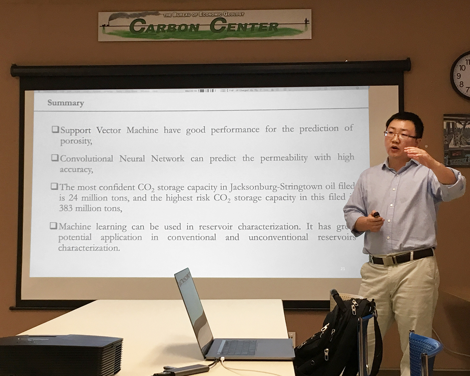 Zhi Zhong shows the summary slide of his presentation which says that machine learning methods of porosity and permeability have high accuracy and that machine learning can be used in unconventional and conventional reservoir characterization with success.